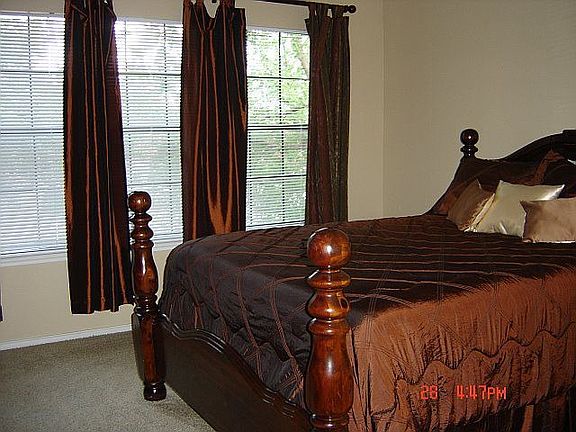 Master bedroom makes great use of natural light!