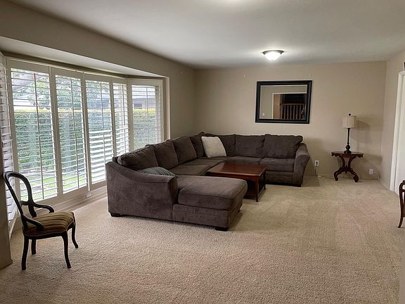 large family room great for friends entertaining , flat panel TV!