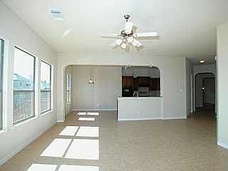 Family Room Looks into Kitchen