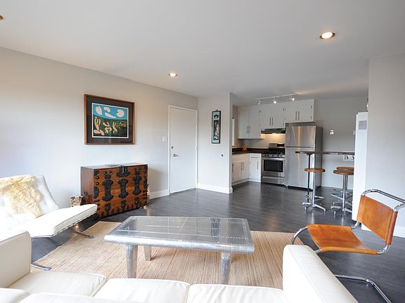 Sunny Upstairs Corner Unit with Open Floor Plan