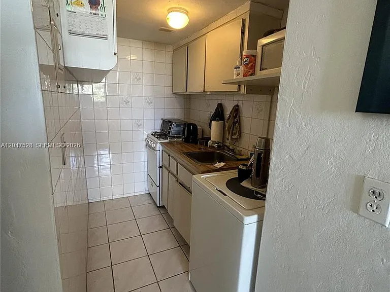 6484 Indian Creek Dr #303 — Photo 2
