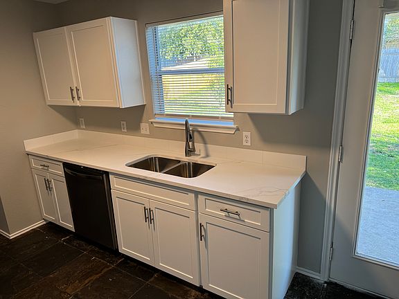 Completely renovated kitchen with brand new cabinets and stainless steel appliances.