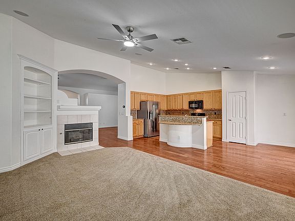 The kitchen and den with a space for a breakfast table.