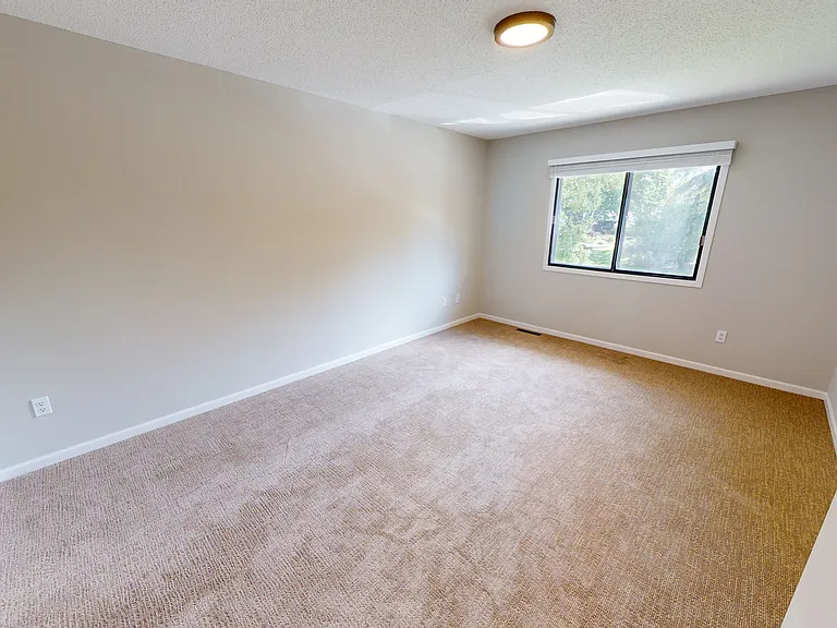 One of the two upstairs bedrooms
