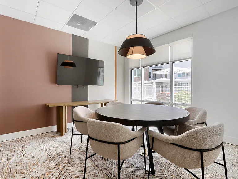 Business done beautifully. Our private conference room seats six and includes a mounted display screen _ ideal for remote work calls, interviews, or small group meetings.