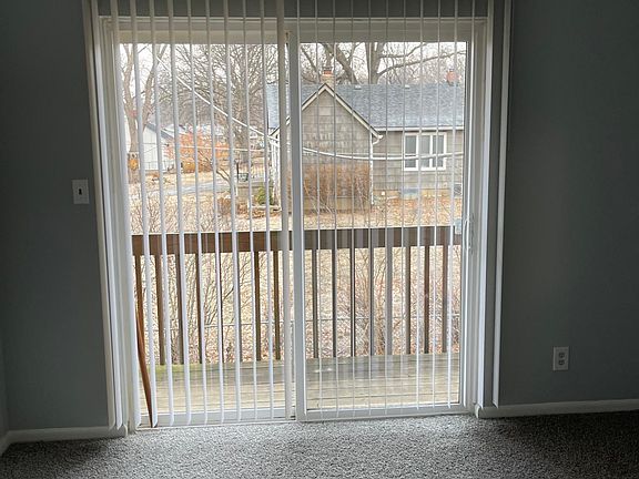 Bedroom sliding door to small balcony