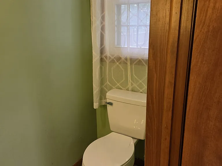 1/2 bath off kitchen / garage
