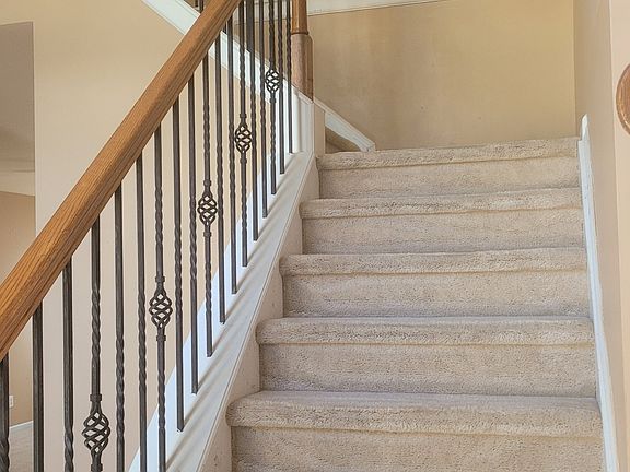 Staircase leading to upstairs.