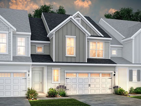 Palomino Exterior 2 features siding, covered front door and 2-car front load garage