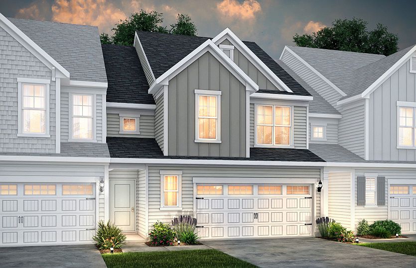 Palomino Exterior 2 features siding, covered front door and 2-car front load garage