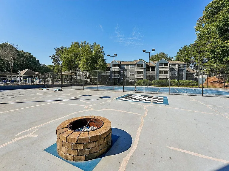 Versatile sports court offering basketball and tennis facilities at Avenues of Kennesaw