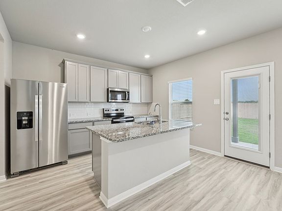 Cook a delicious meal in this beautiful kitchen.