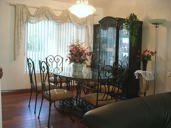 Dining Room with Backyard Green View