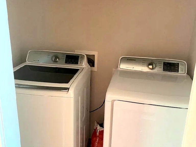 Laundry Room behind a pocket door in upstairs hallway