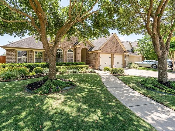 The traditional elevation of 19731 Hubbard Creek Ct is just a hint of all the wonderfulness that awaits inside!