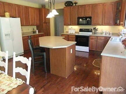 Cherry cabinets throughout kitchen