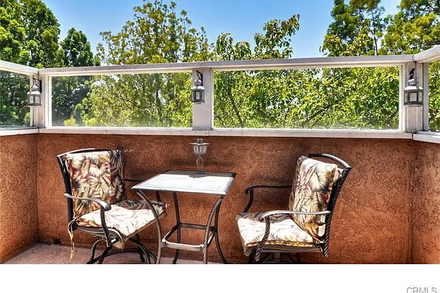 Private patio with lots of greenery