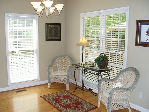 The Breakfast room, right off the kitchen, has oversized windows and plenty of room.