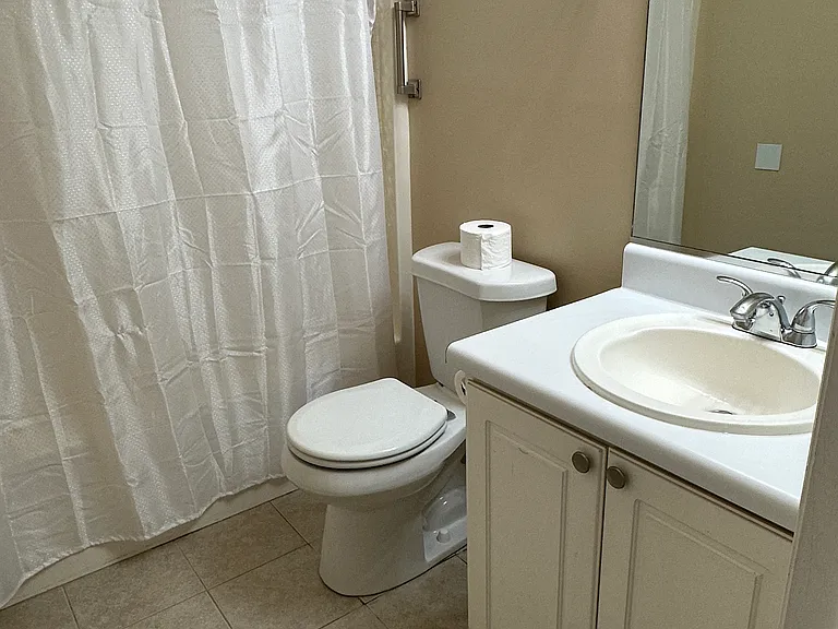 Second bathroom has a bathtub with shower