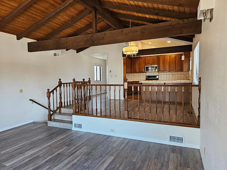 View from living room towards dining area and kitchen.
