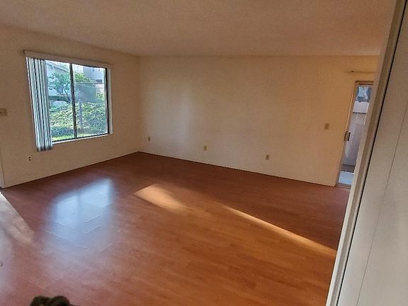 Living Room with nice view and huge window.