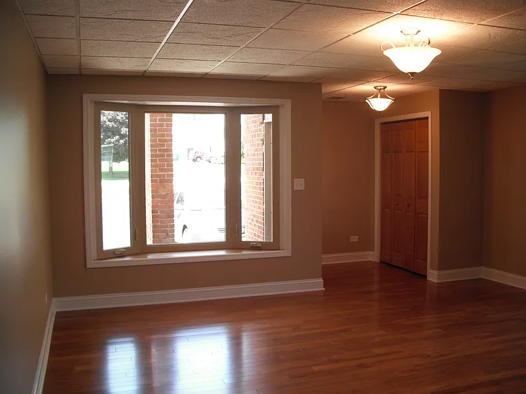 Living area. Front bay window