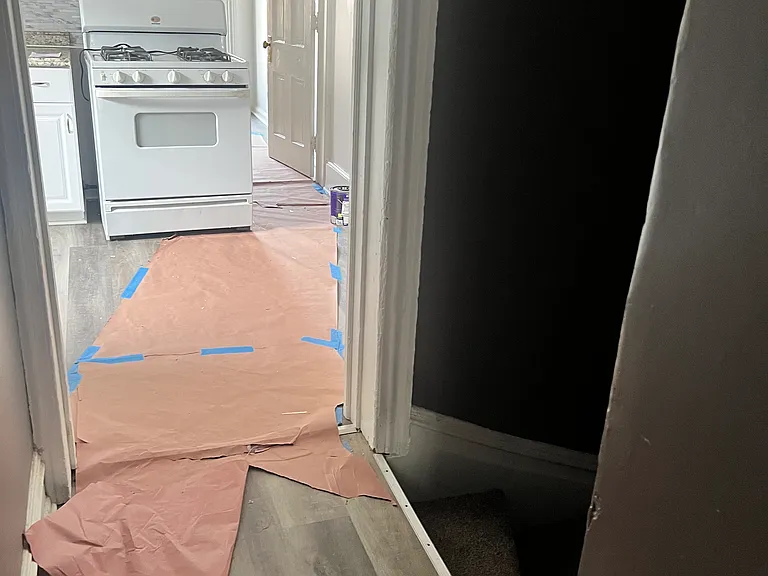 stairs to unit and kitchen