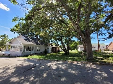 This treed lot is on the corner and provides plenty of shade.
