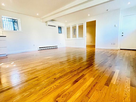 LR, note hardwood floors and recessed lights