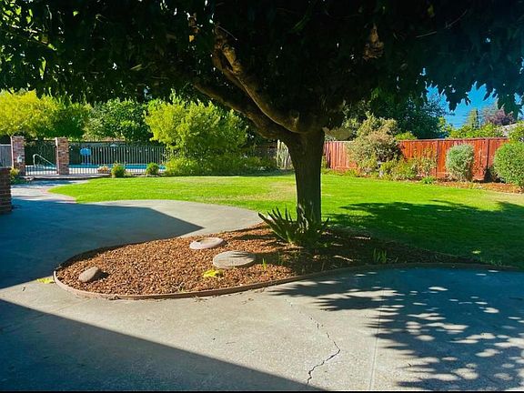 Both paved and landscaped lawn