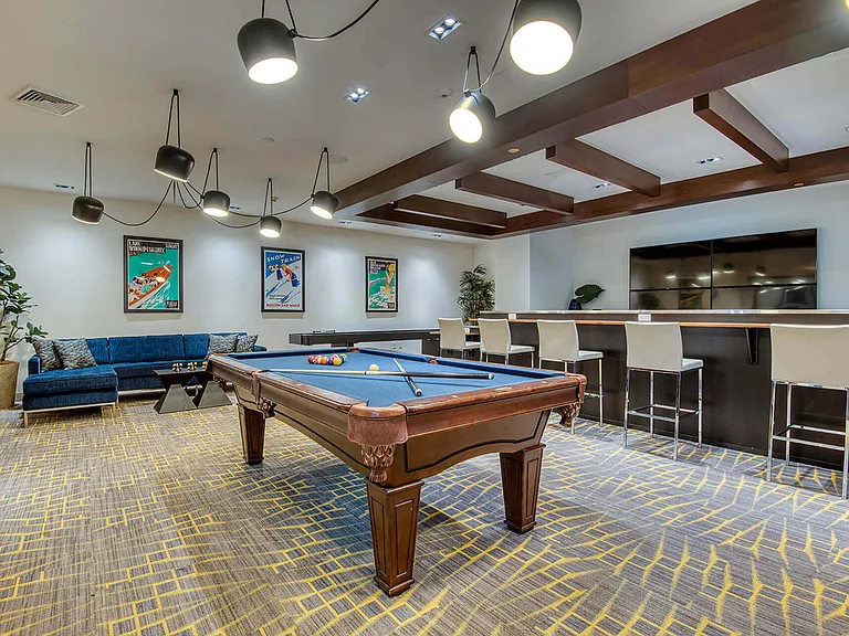 Hone your billiard skills or play a game of shuffleboard in the Resident Club Suite