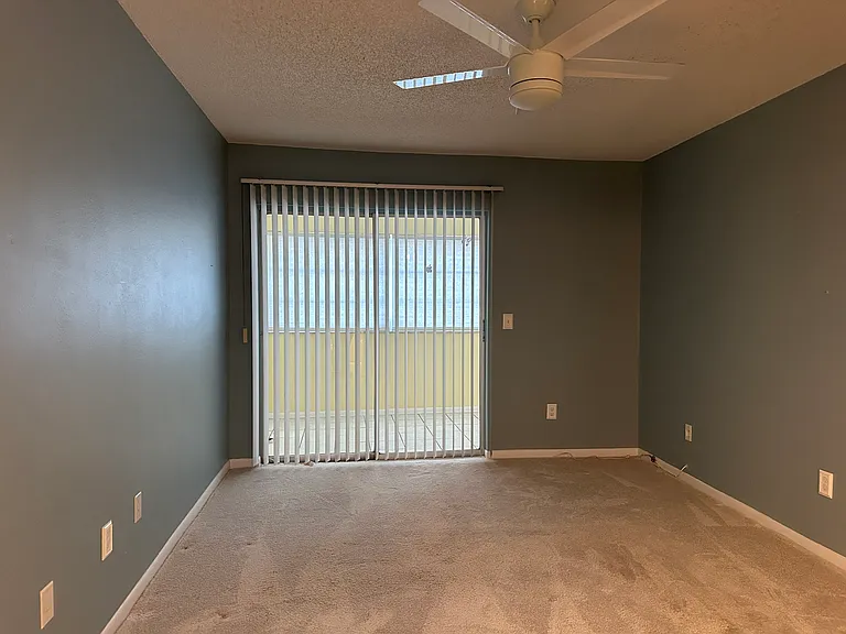 Primary Bedroom W/ sliders to Floirda room