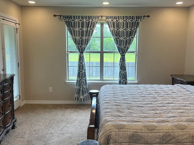 Owner Suite Bedroom with recess, lighting, as well as a coffered lighting in the Crawford ceiling