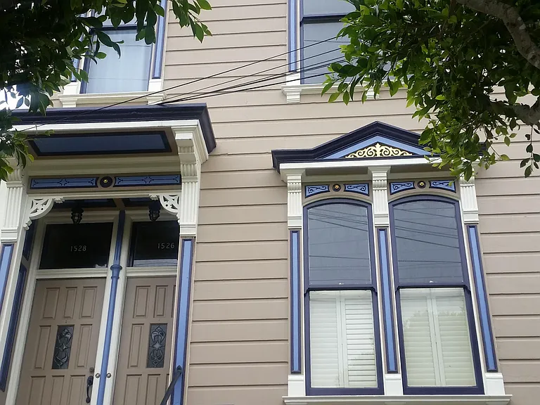 Lovely Victorian. Unit is the upper one, so you use the door on the left.
