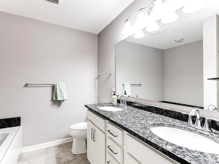 8974 SW Village Loop — Photo 18