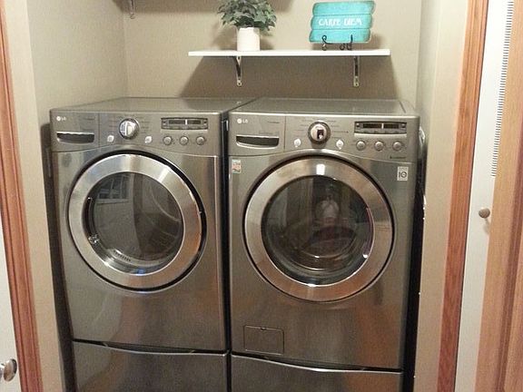 Newer LG state of the art appliances : Nice laundry room also hides away water heater, electrical pa