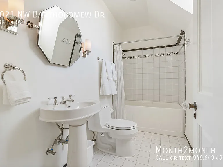 9021 NW Bartholomew Dr — Photo 12