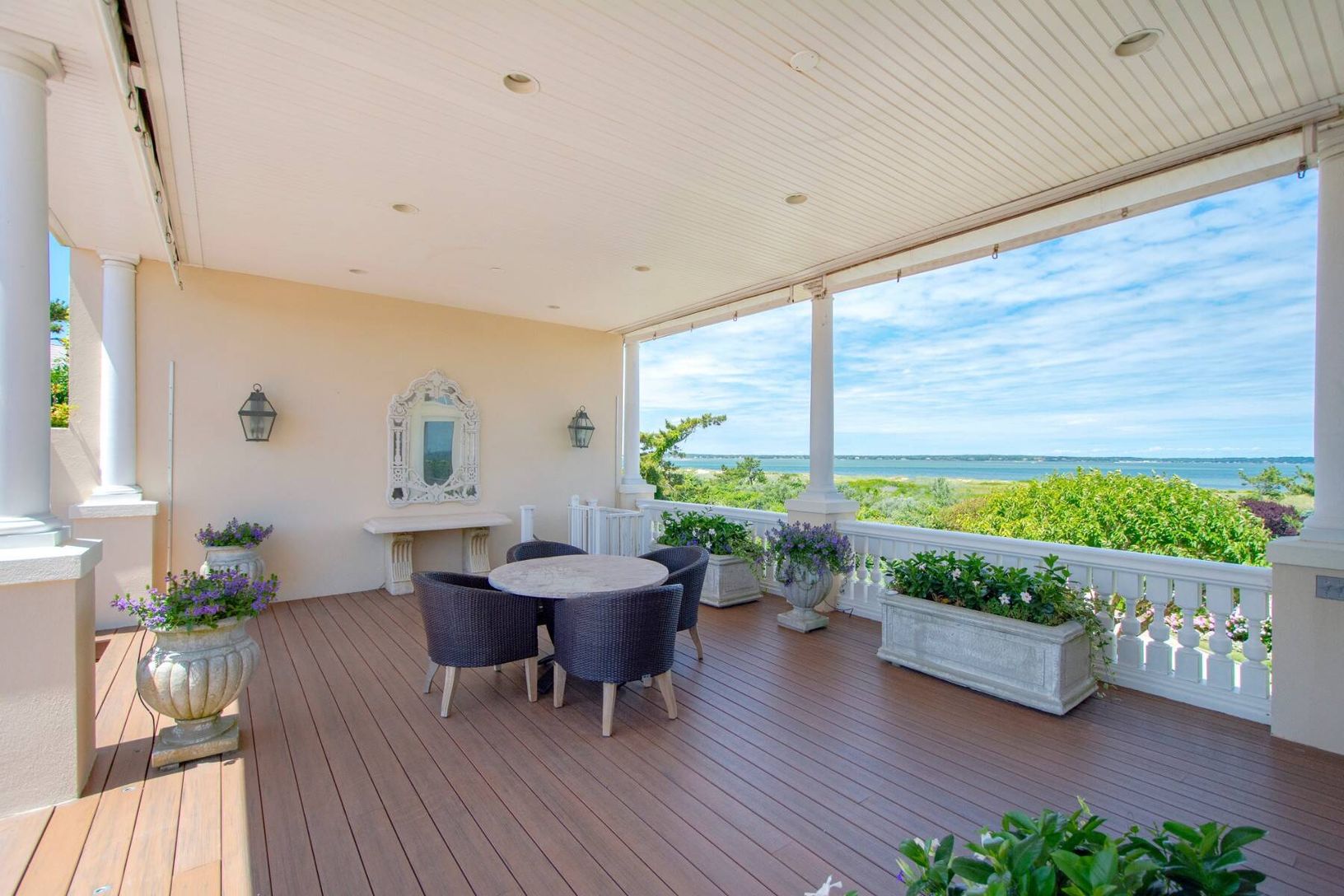 Covered Porched with Wide Bay Views