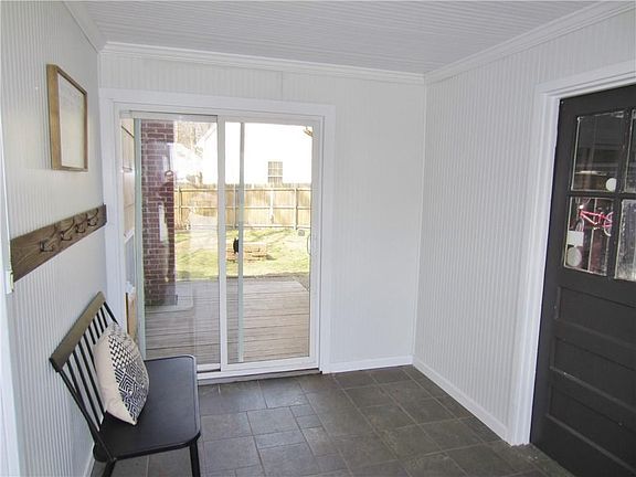 Mud Room / Breeze Way with Sliding Glass Door!