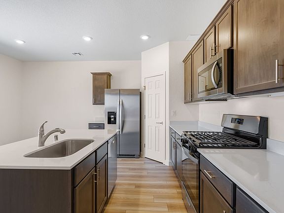 Each kitchen comes with stainless-steel, appliances included.