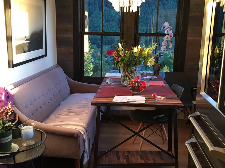 Cozy dining Room has Views up to Ski Area and Bear Creek, as well as overlooking town.