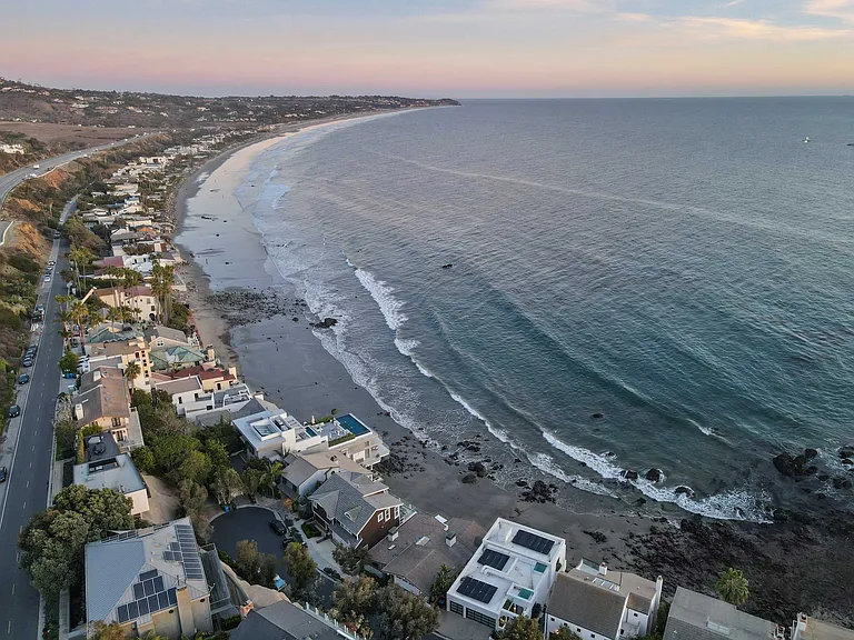 Endless blue waters and sandy shores.