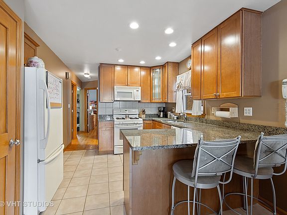 5th image of 3455 N Ozanam Ave