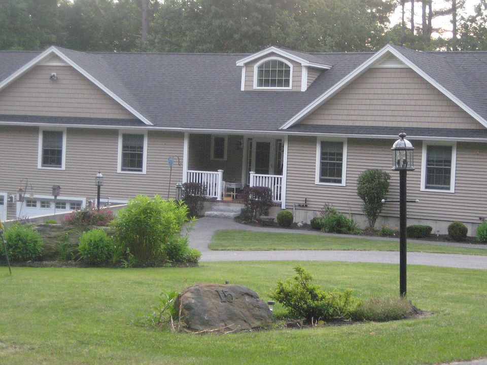 Front w/ 3 car garage below