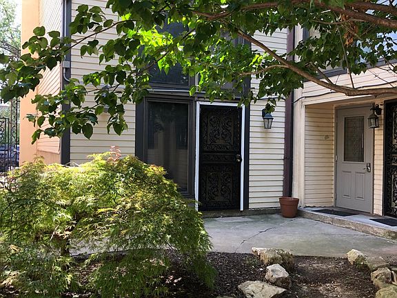 Front door to condo unit within the courtyard