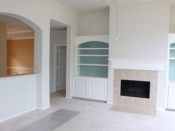 Here you can see how flowing this floor plan is. The door leads to a private Master Bedroom.