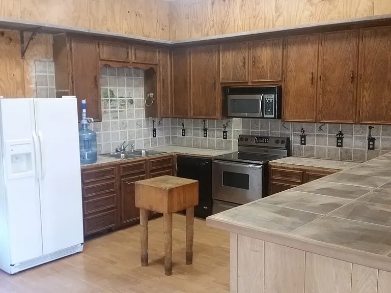 Full kitchen with very large island/bar