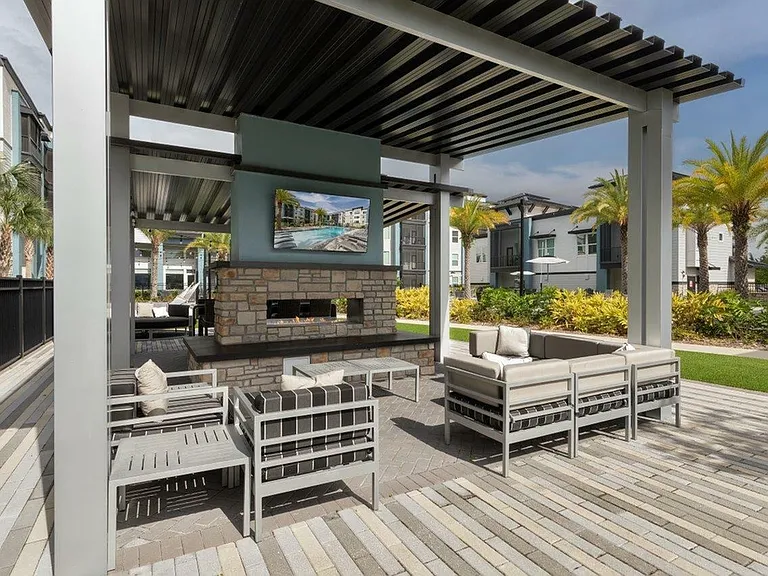 The Addison Universal Blvd Outdoor Fireplace and Seating