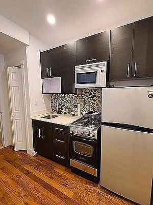 1st image of 611 E 11th St APT 1C