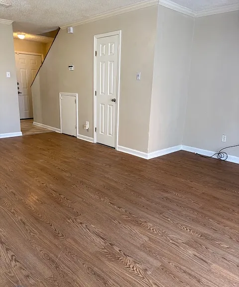 View from back of living room to entrance